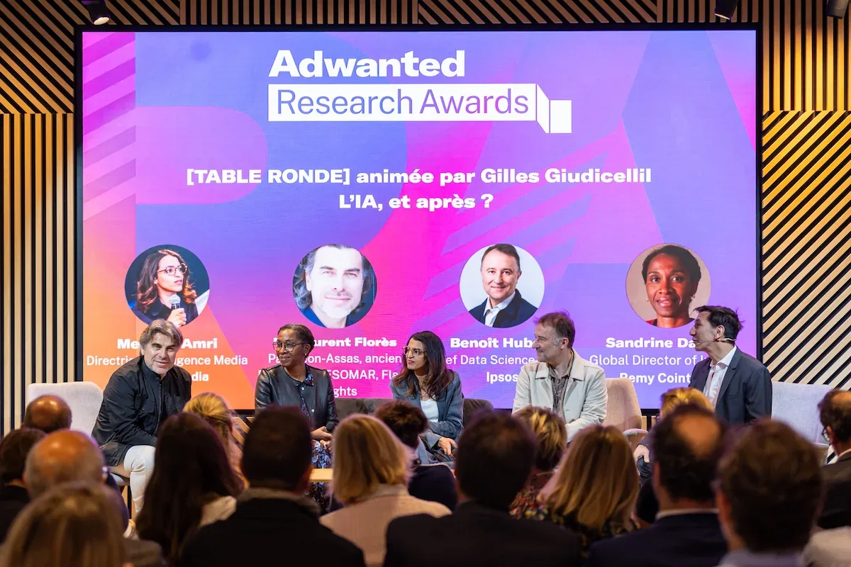 The speakers of the “AI, what next?” panel on stage in front of the Adwanted Research Awards audience.